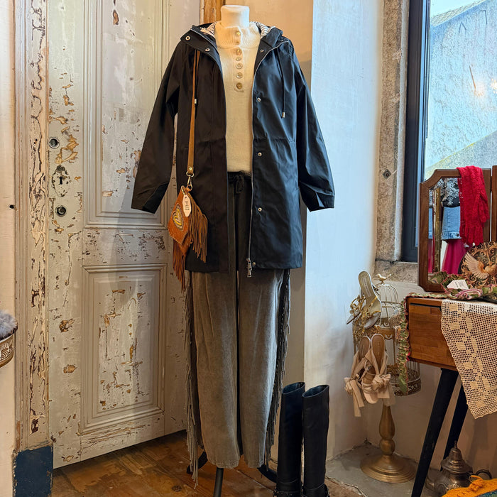 TE protege | Capa de Chuva