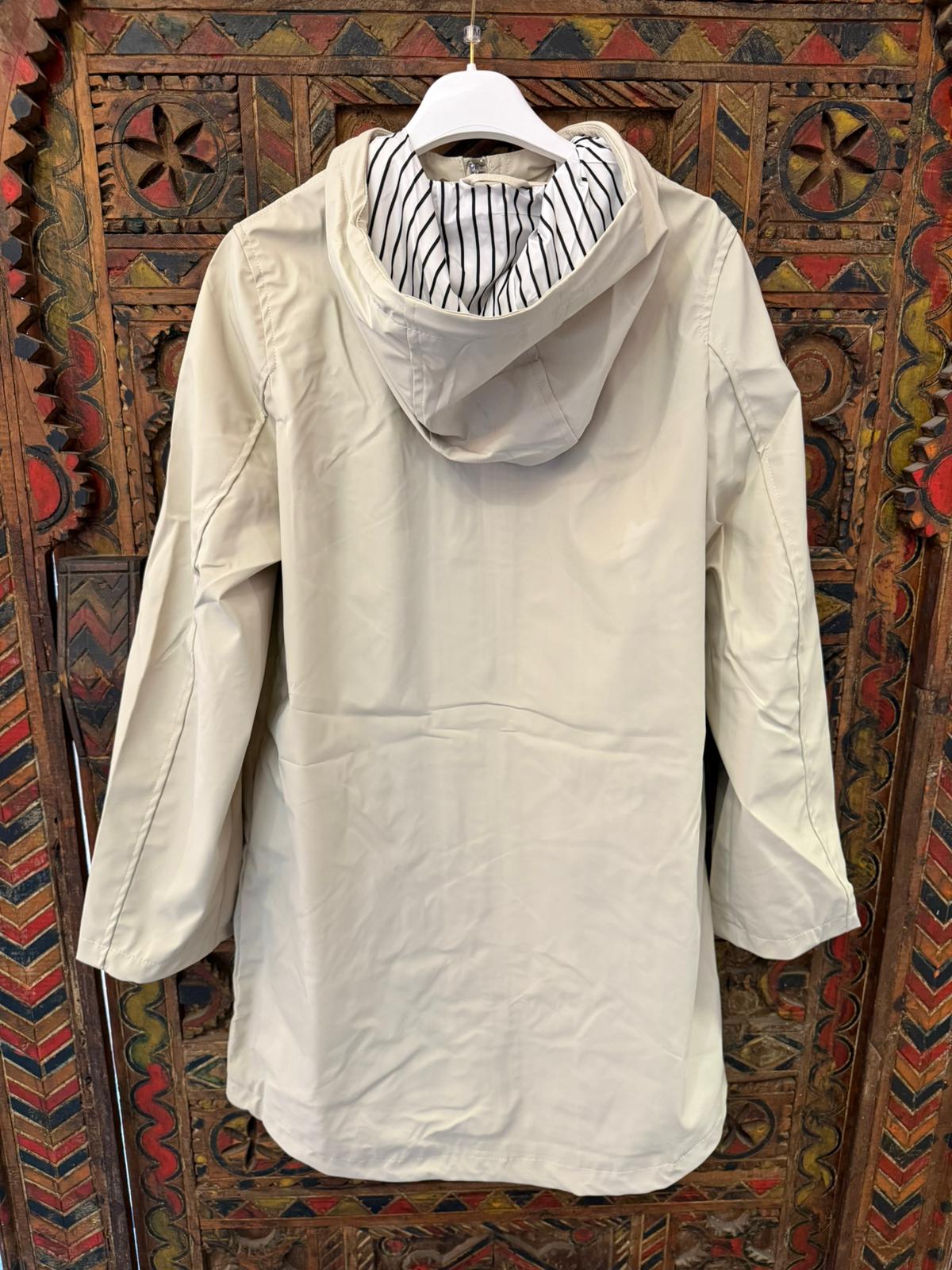 TE protege | Capa de Chuva