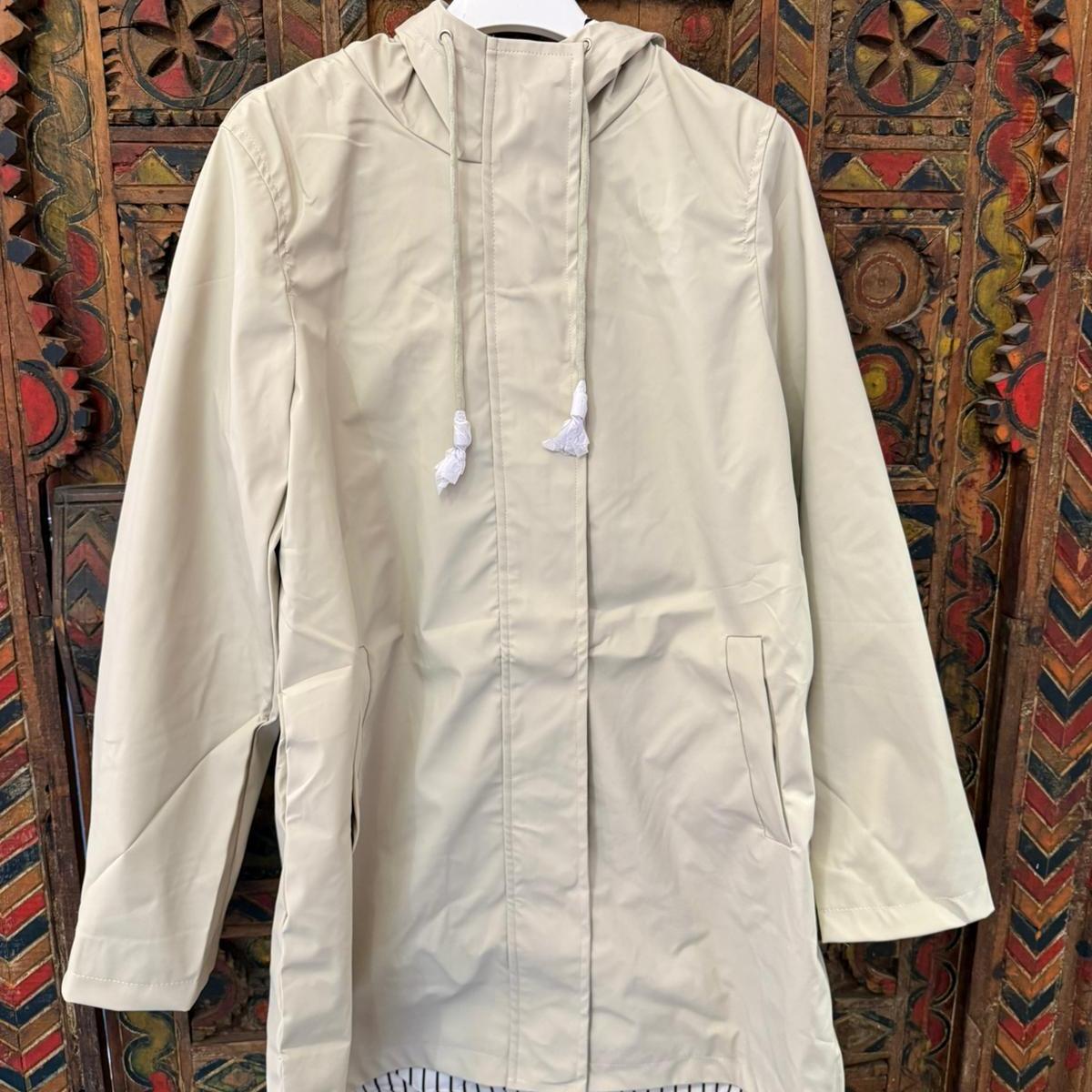 TE protege | Capa de Chuva