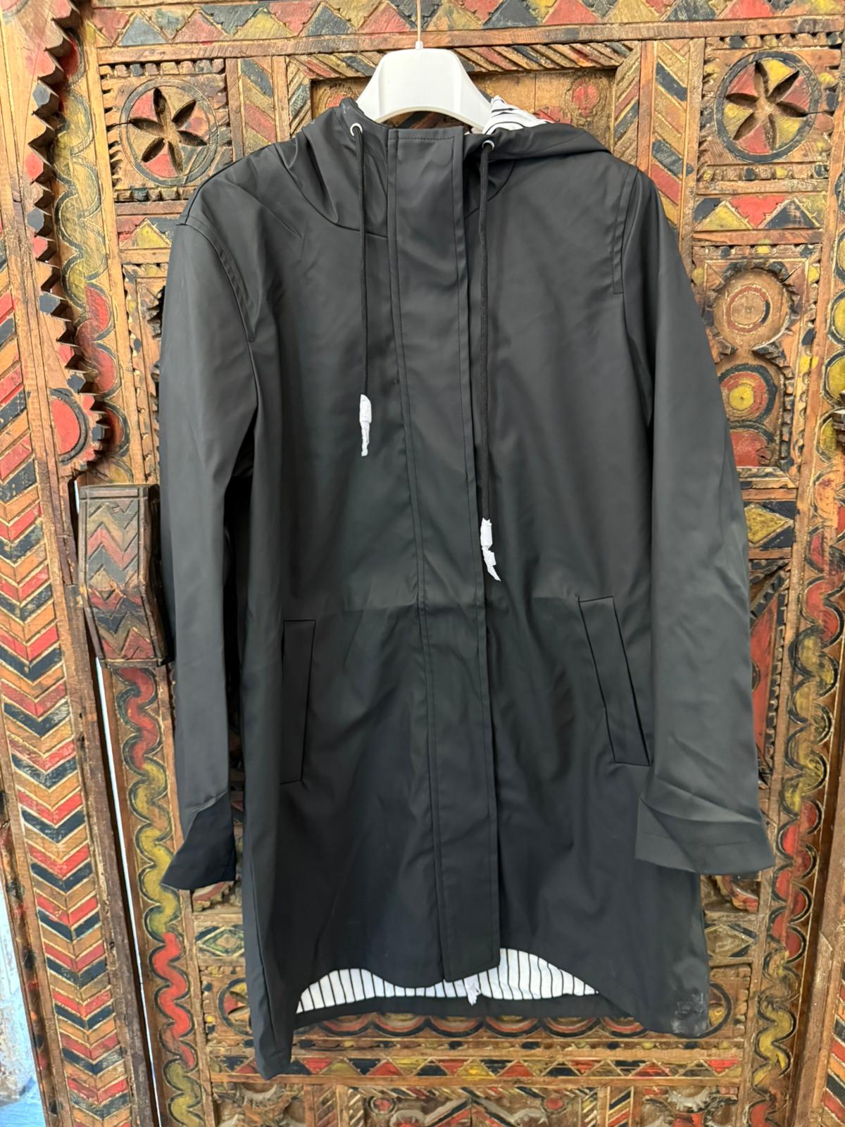 TE protege | Capa de Chuva