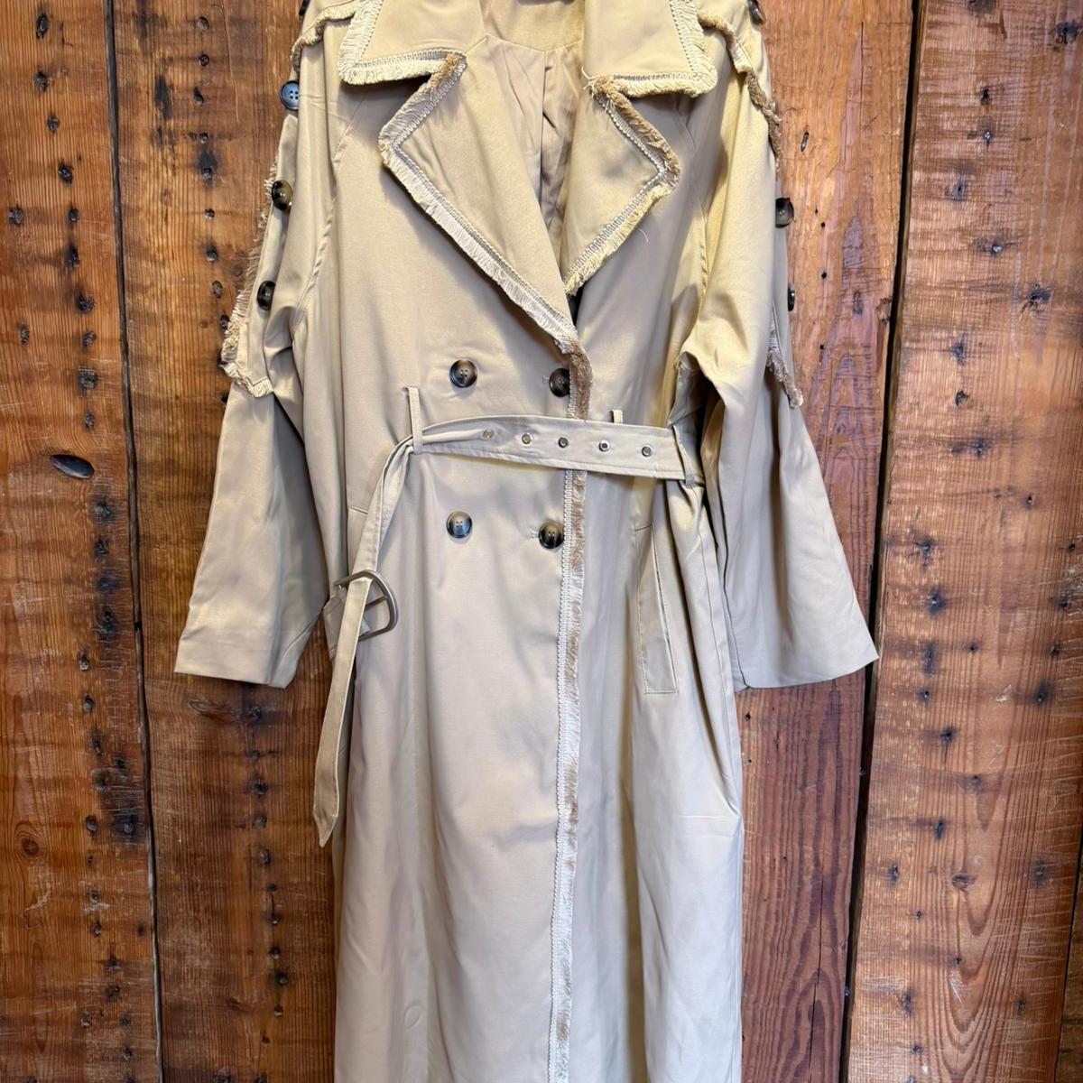 TE firma | Gabardina