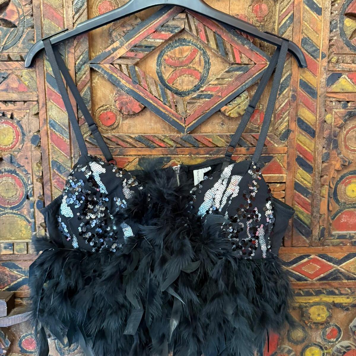 Jade | Top plumas