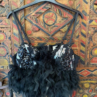 Jade | Top plumas