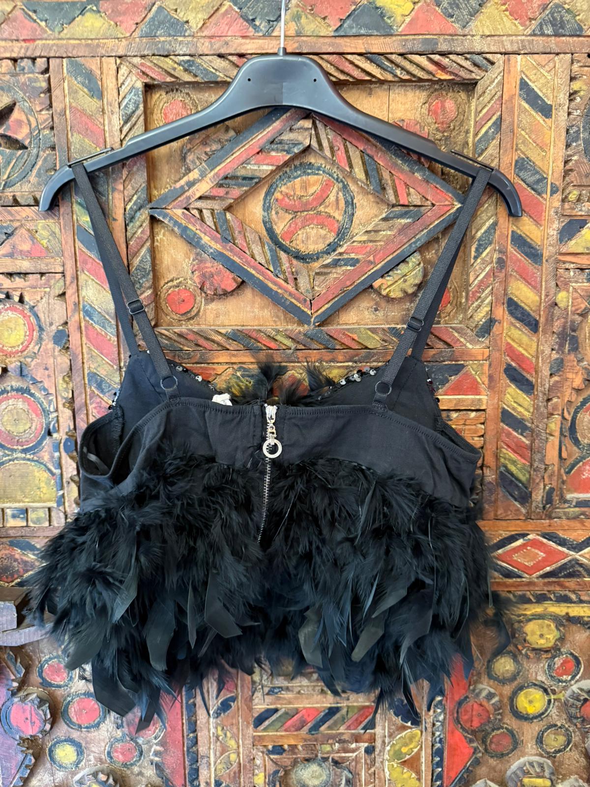 Jade | Top plumas